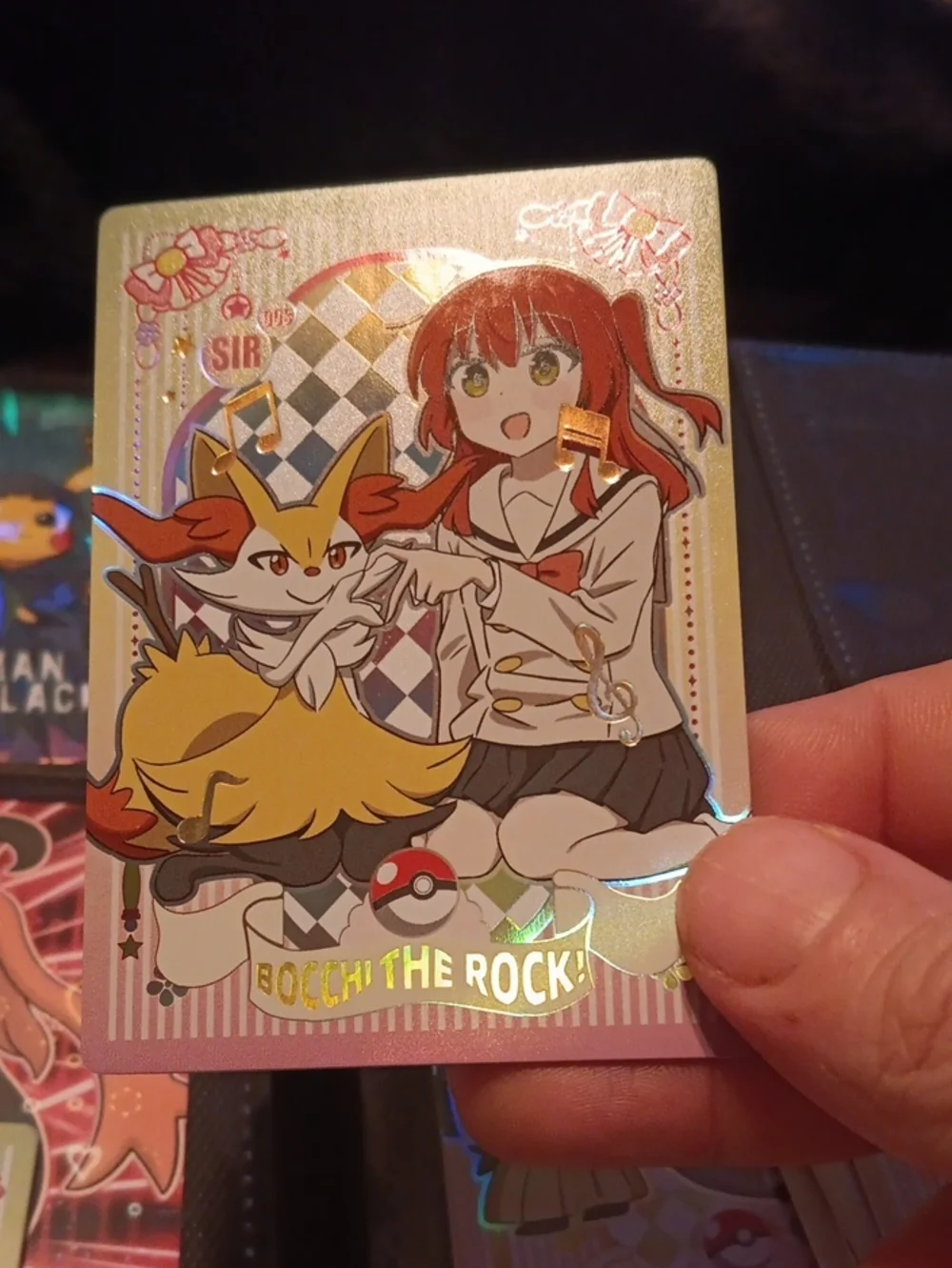 Pokemon Gold Foil Bocchi The Rock! Trading Card with Red and Yellow Artwork